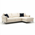 Cotton upholstered sectional sofa in cream fabric with black accent pillows
